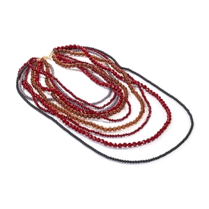 Ethnic multi-layer beaded necklace with vibrant gradient strands and golden clasp