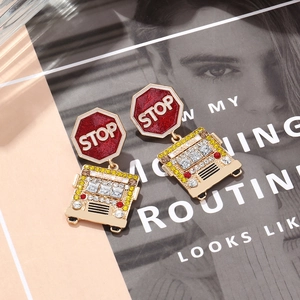 Creative school bus and stop sign earrings with colorful rhinestones in golden finish
