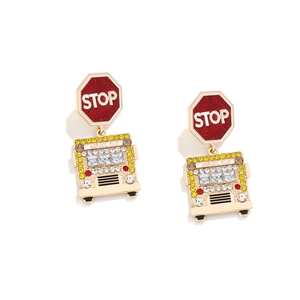 Enamel school bus earrings with red STOP sign pendant and sparkling yellow rhinestones