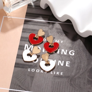 Fashion heart drop earrings in red and white enamel with gold-plated alloy finish