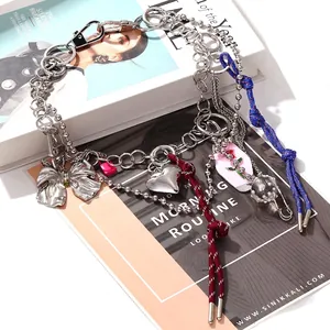 Layered Y2K necklace with heart charms, enamel flowers and pearl pins on chunky metal chains