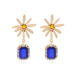 Elegant daisy flower earrings with deep blue glass pendant and rhinestones in gold setting