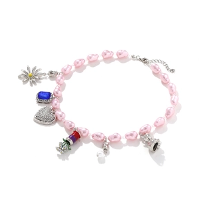 Pink baroque pearl necklace featuring 3D heart, floral, and cat pendants with silver accents