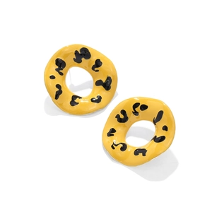 Fashionable yellow enamel hoop earrings with bold black leopard print on white background