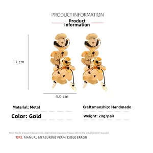 Detailed size specifications of long gold floral earrings with 11cm height and 4cm width