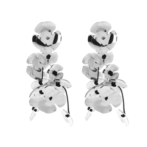 Exaggerated silver metallic floral drop earrings with layered petals and beaded details