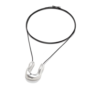 Minimalist silver U-shaped pendant necklace with black cord on white background