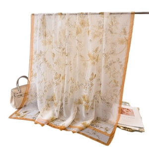 Lightweight floral print long shawl scarf in beige and orange for sun protection
