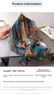 Detail of 185x120cm floral polyester scarf with vibrant orange flowers and soft texture