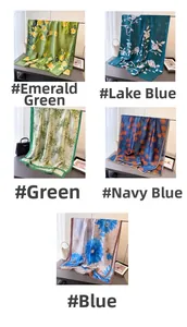 Detail showing five different floral print silk scarves with premium hemmed edges