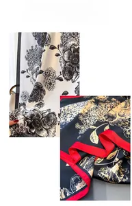 Detail of floral printed faux silk scarf showing delicate patterns and contrasting edges