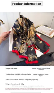Detail of floral silk-feel scarf with red borders, 180x80cm dimensions and 125g weight