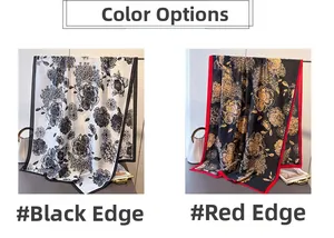 Detail view of large floral print silk scarves in black and white color options