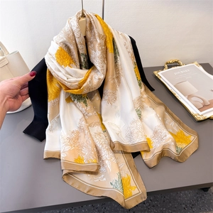 Elegant floral silk satin scarf with yellow chrysanthemum print and striped edges