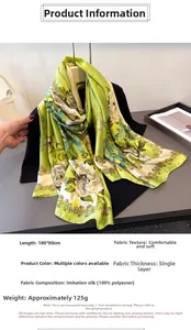 Detail of green floral silk-like scarf measuring 180x80cm with elegant pattern design