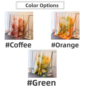 Detail view of large faux silk scarves in coffee, orange and green abstract floral prints