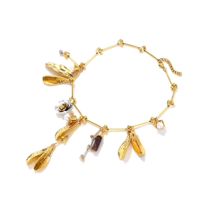 Elegant gold leaf and pearl pendant necklace with vintage floral and gemstone details