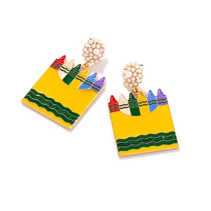 Colorful crayon box earrings with imitation pearls and vibrant enamel finish on yellow base