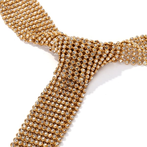 Luxurious gold-tone mesh tie necklace with sparkling rhinestones in a retro lattice style