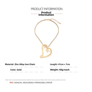Detailed view of golden heart pendant with 41cm snake chain and 7cm extension link