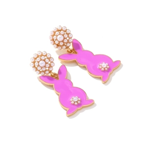 Pink enamel rabbit earrings with round pearl studs and small floral accents in gold finish