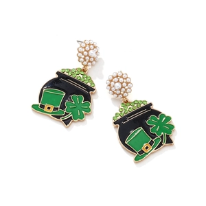 Detail of St. Patrick's Day earrings with green rhinestone cauldron and pearl studs