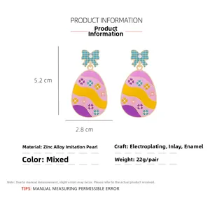 Detail view of colorful Easter egg earrings with dimensions 5.2cm height and 2.8cm width