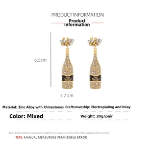 Detail view of champagne bottle earrings with Happy New Year text and 6.5cm dimensions