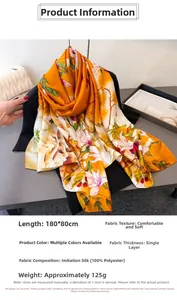 Detail of floral faux silk scarf measuring 180x80cm in orange and white floral print