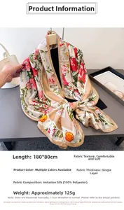 Detail showing 180x80cm floral satin scarf on hanger with vibrant printed patterns