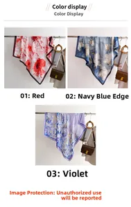 Vue détaillée de grands foulards carrés en soie aux motifs floraux rouge, marine et violet