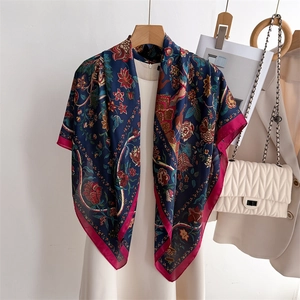 Vintage floral silk scarf with deep blue patterns and magenta borders on white dress