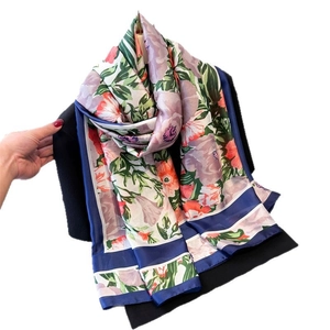 Floral satin silk scarf with pink purple flowers and dark green leaves on white background
