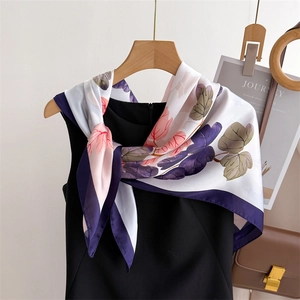 Elegant floral faux silk square scarf with soft leaf prints and purple borders