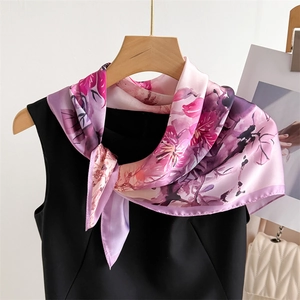70cm floral satin scarf with elegant pink and purple prints on a black sleeveless top