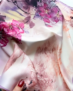 Detailed view of 70cm silk scarf with purple floral print and smooth satin texture