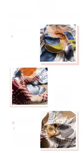 Detail view of printed silk scarf showing fine geometric patterns and hemmed edges
