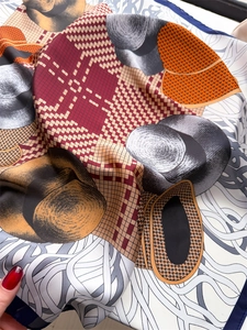 Detailed view of 70cm silk-like scarf with vintage hat patterns and vibrant grid prints