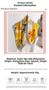 Detailed macro view of smooth satin polyester scarf with yellow and grey floral print pattern