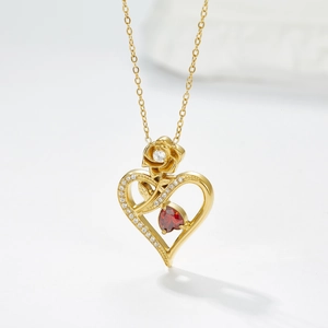 Gouden titanium stalen hart ketting met rode steen en roos detail voor dames