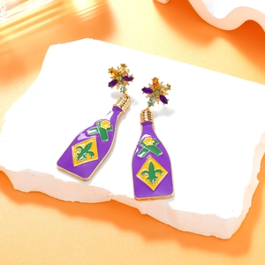 Detail of Mardi Gras bottle earrings with purple enamel and Fleur-de-lis pattern