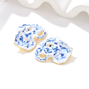 Handmade enamel elephant stud earrings with blue marble texture and gold metal plating