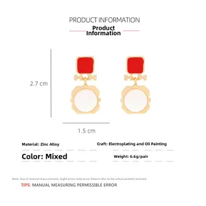Detail showing dimensions 2.7x1.5cm and weight 6.6g of enamel geometric drop earrings