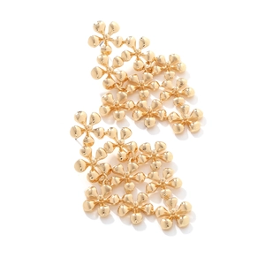 Vintage gold layered floral drop earrings with intricate metal petals and leaf motifs