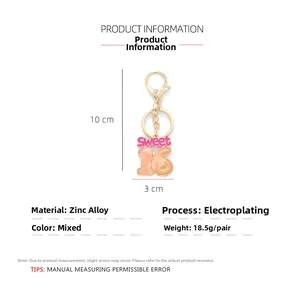 Close-up of pink Sweet 16 gradient drip oil pendant keychain in golden zinc alloy