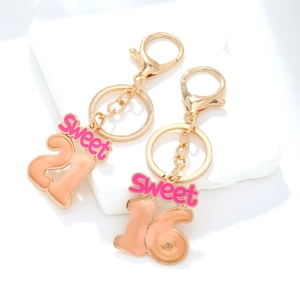 Sweet 16 and 21 enamel keychains with pink gradients and gold lobster clasps