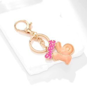 Pink enamel Sweet 16 birthday keychain with gold alloy lettering and lobster clasp