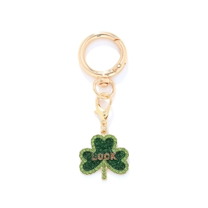 Porte-clés doré avec pendentif trèfle vert orné de strass et gravure mot LUCK