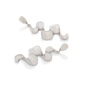 Macro shot of silver wavy liquid metal earrings with a high-gloss polished finish