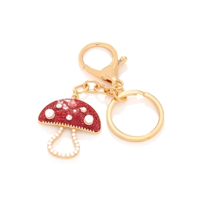 Cute red glitter mushroom keychain with pearls and crystals on a golden ring